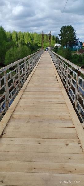 На минувшей неделе проведена замена деревянного настила пешеходного моста Гагарино – п.Заря.